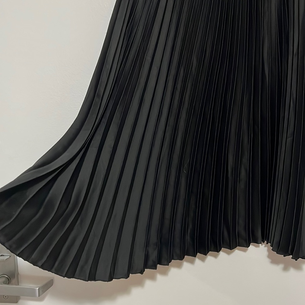 Black pleated satin midi skirt